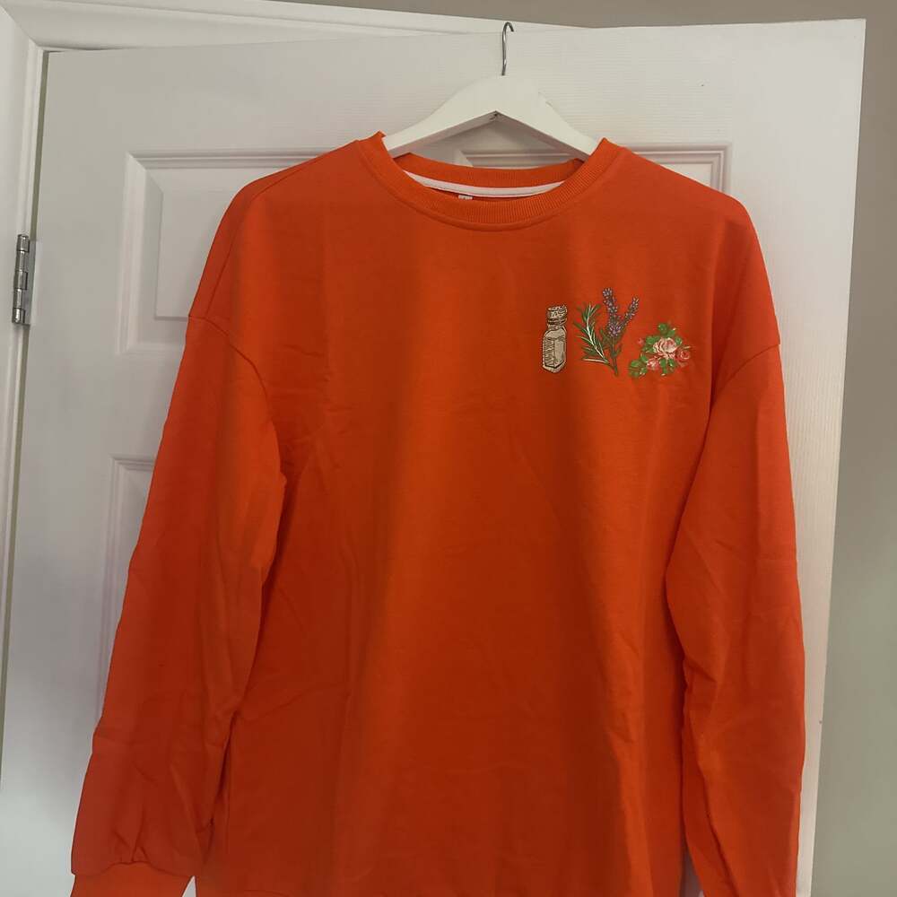 Orange Sweatshirt with Embroidered Bottle and Flowers, Crewneck, Long Sleeve